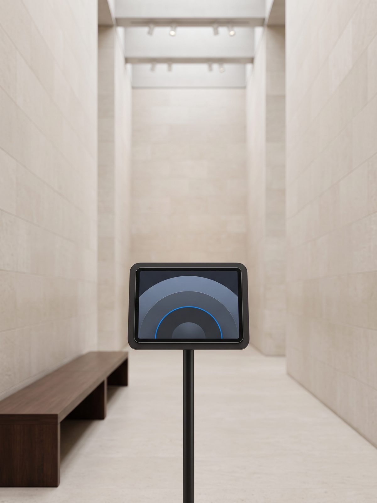 iPad Pro visitor kiosk on a floor stand in a public institution lobby, locked down and managed through MDM
